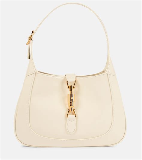 Gucci Jackie small shoulder bag in ivory patent leather 